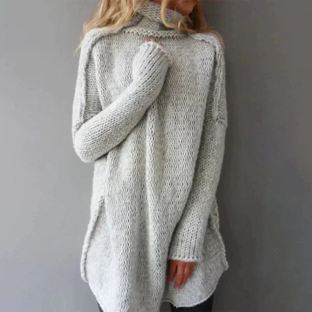 Sweter damski oversize ażurowy z golfem i asymetrycznym dołem