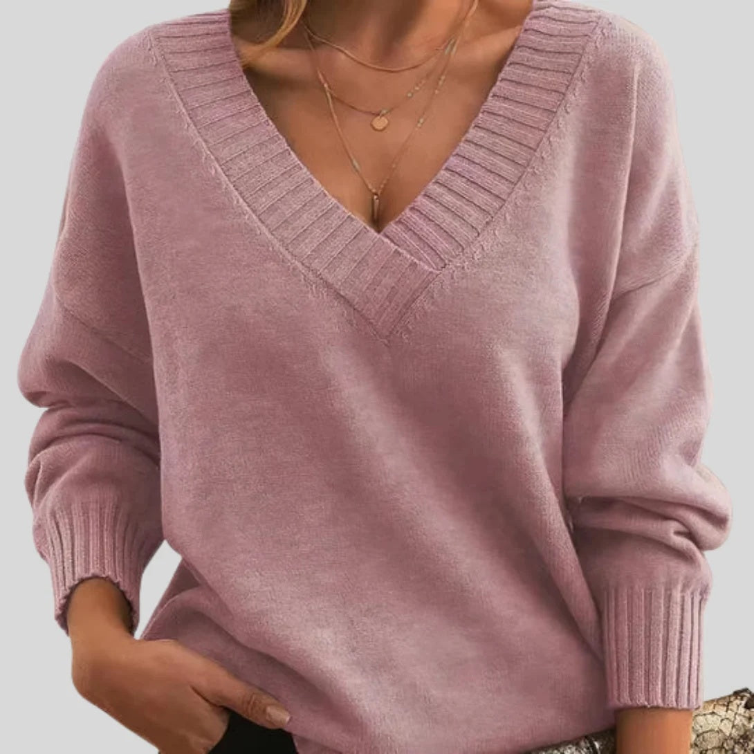 Sweter damski oversize z dekoltem w serek i długimi rękawami - Różowy