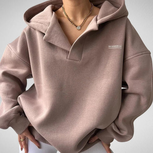 Bluza damska oversize z kapturem i otwartym dekoltem w serek - Różowy