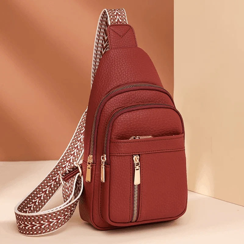 Torba damska crossbody z regulowanym paskiem i kieszeniami na zamek - Czerwony