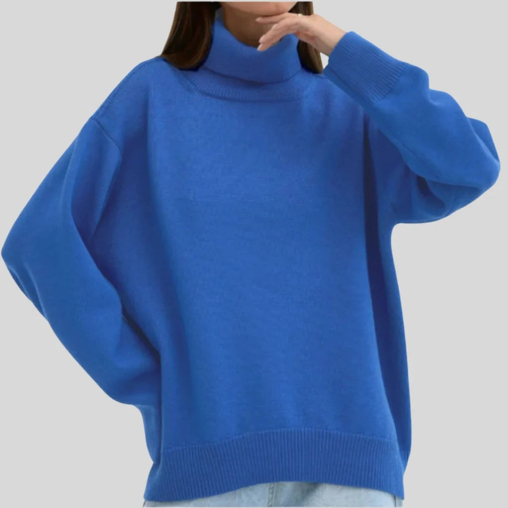 Sweter damski oversize z golfem i obniżoną linią ramion - Ciemnoniebieski