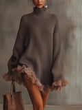 Sweter damski oversize z golfem i falbanami przy mankietach oraz dole