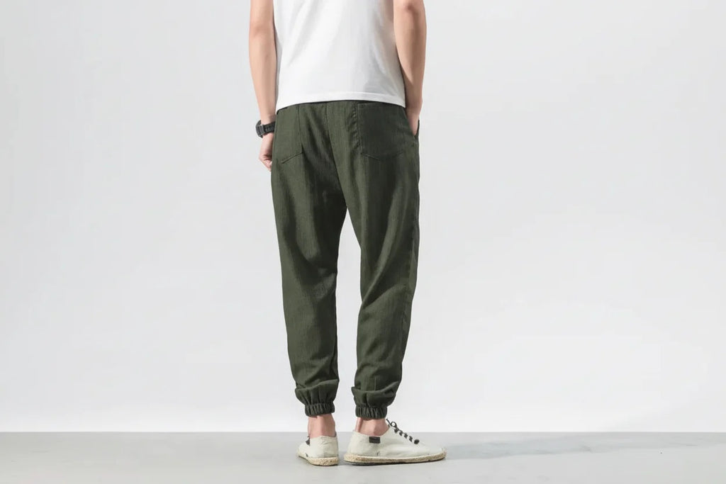 Spodnie męskie joggery o luźnym kroju ze ściągaczami - Zielony