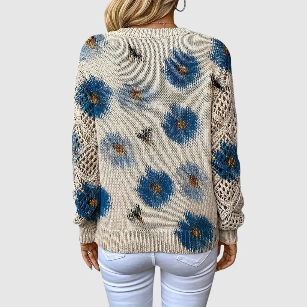 Sweter damski w kwiaty z dekoltem w serek i ażurowymi rękawami - Niebieski