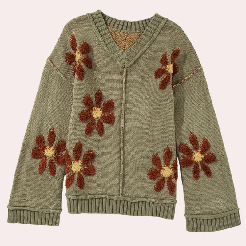 Sweter damski w kwiaty z dekoltem w serek i szerokimi rękawami