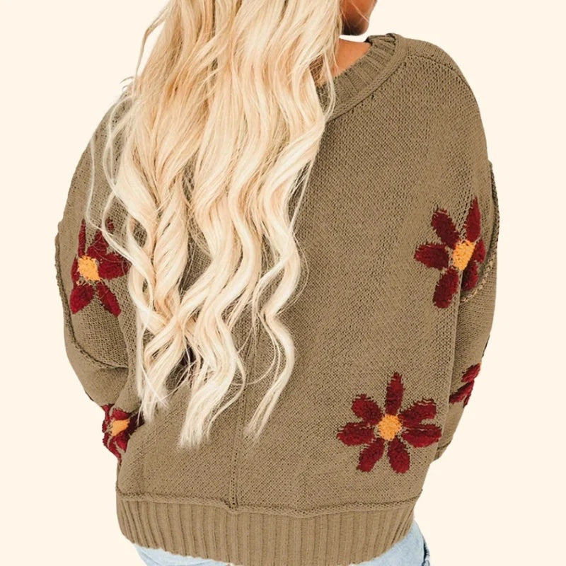 Sweter damski w kwiaty z dekoltem w serek i szerokimi rękawami