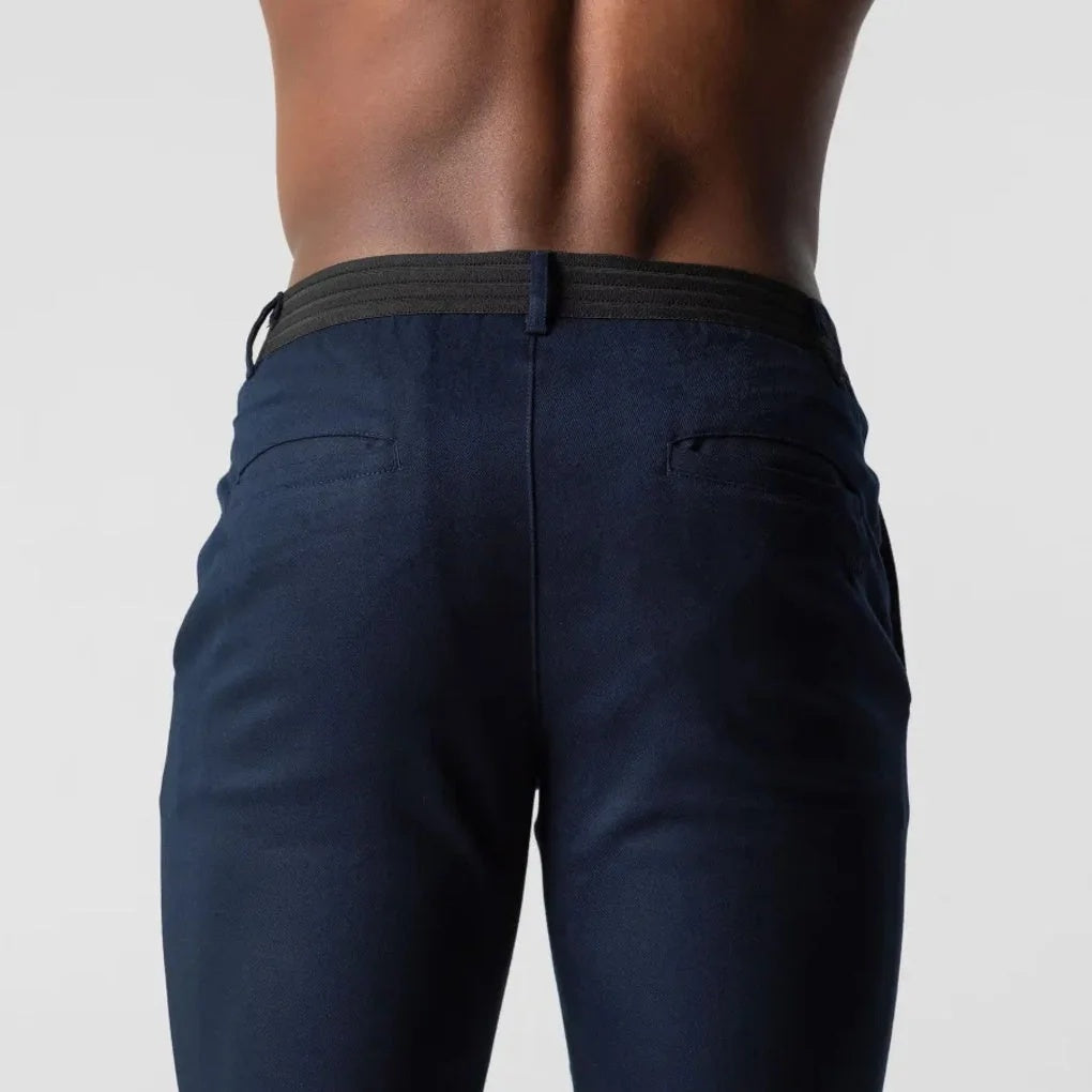 Spodnie męskie zwężane o długości do kostek z kieszeniami i szlufkami - Granatowy
